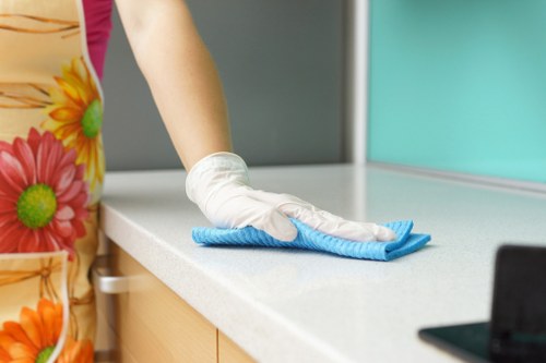 Steam carpet cleaning technician preparing carpet for deep cleaning