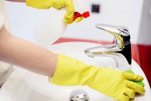 Person treating a fresh fabric stain carefully